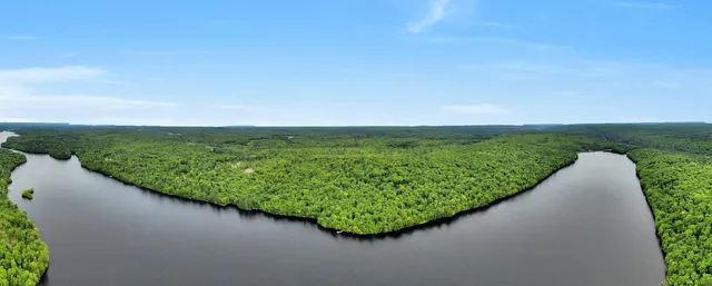 a view of a lake with a big yard