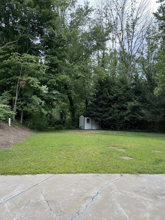 656 Franklin Street, Unit 656 Wrentham, MA 02093 - Photo 2 of 11 a view of a backyard
