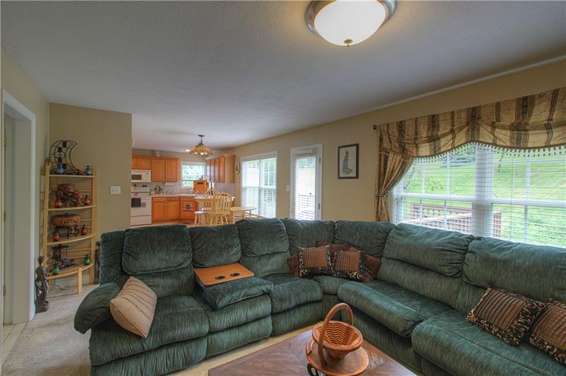 108 Chestnut Ridge Drive Beaver Falls, PA 15010 - Photo 7 of 25 Family Room overlooks the back deck and opens to the hub of the home!