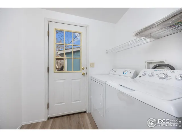 a utility room with a window dryer and washer