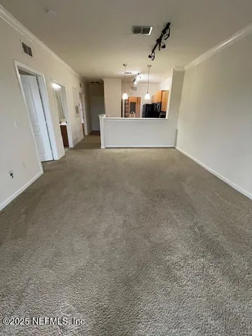 a view of a room with windows