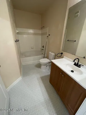 a view of balcony with furniture