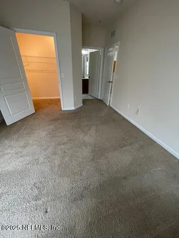 a view of a room with racks on the wall