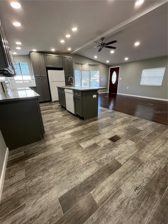 12100 Seminole Boulevard, Unit 365 Largo, FL 33778 - Photo 13 of 32 a view of an empty room with a fireplace