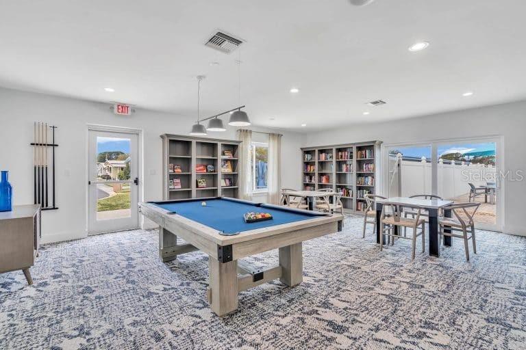 12100 Seminole Boulevard, Unit 365 Largo, FL 33778 - Photo 29 of 32 a room with furniture pool table and window