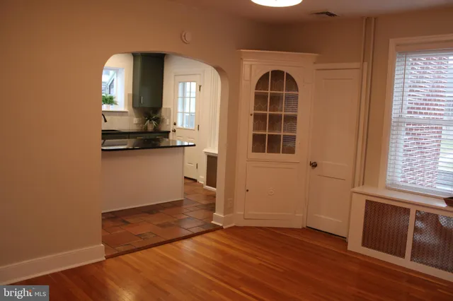 a kitchen with sink and window