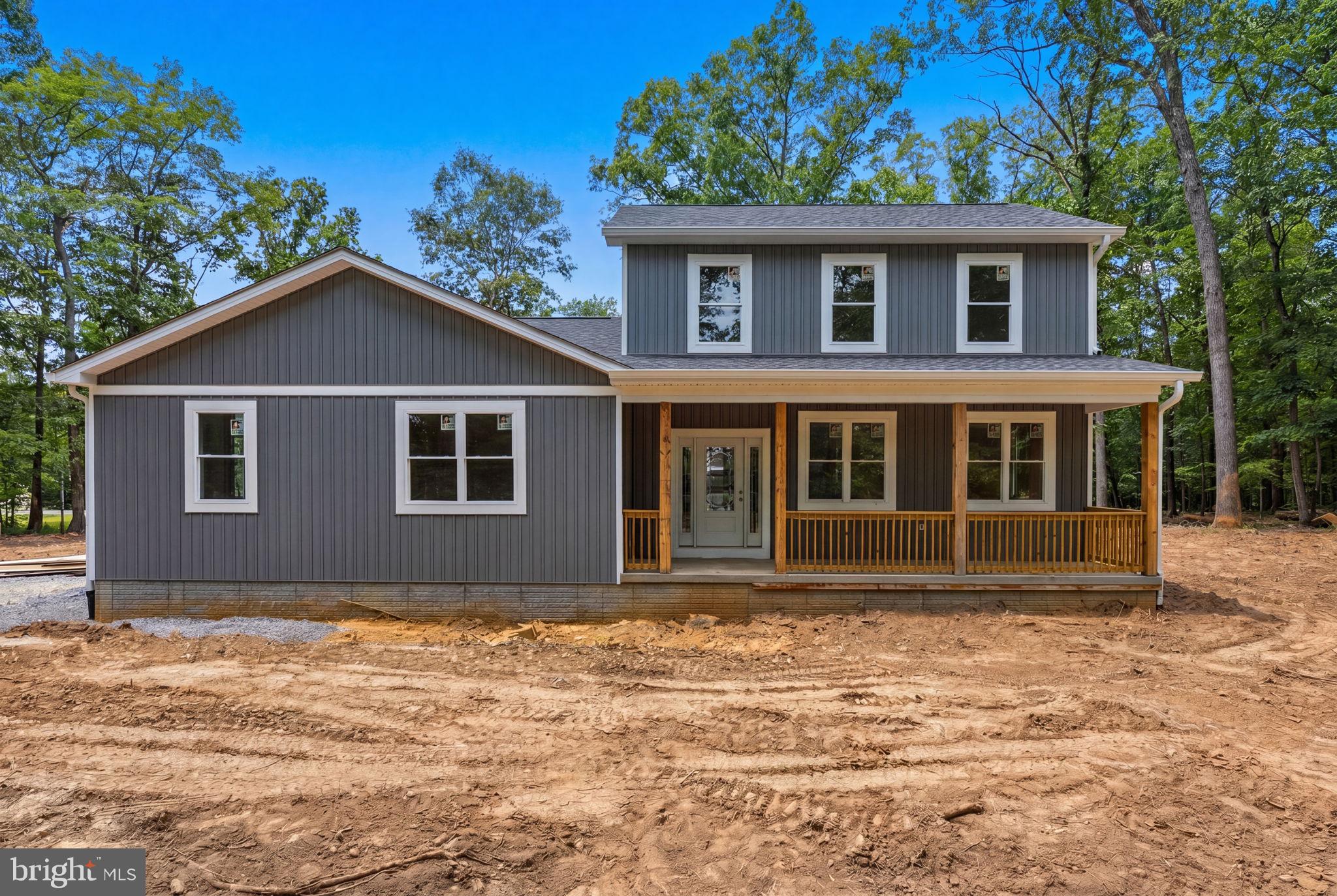 10339 Back Creek Valley Road Hedgesville, WV 25427 - Photo 2 of 48 a house with a outdoor space