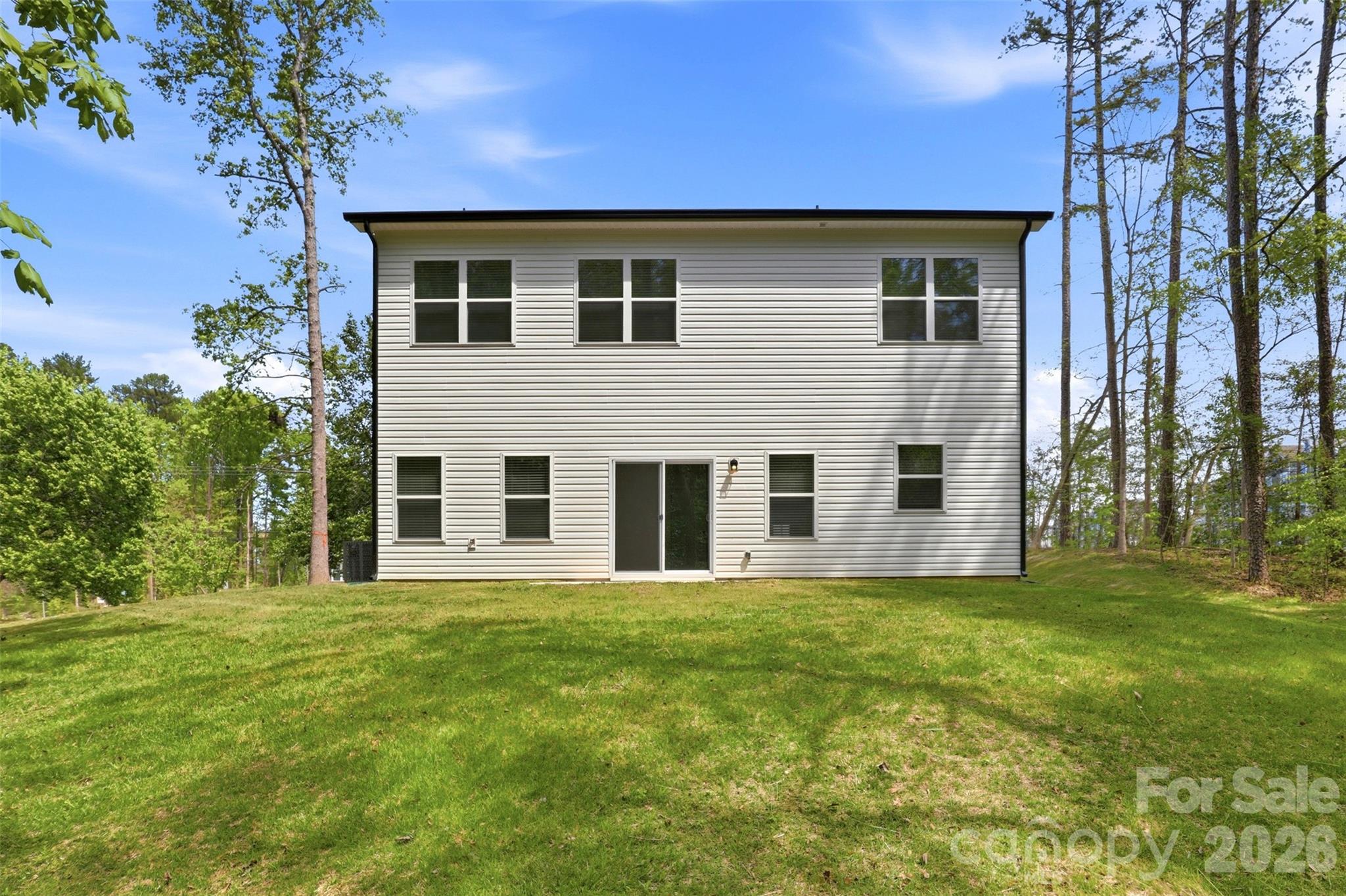 4015 Oakdale Road Charlotte, NC 28216 - Photo 20 of 30 a big yard with large trees