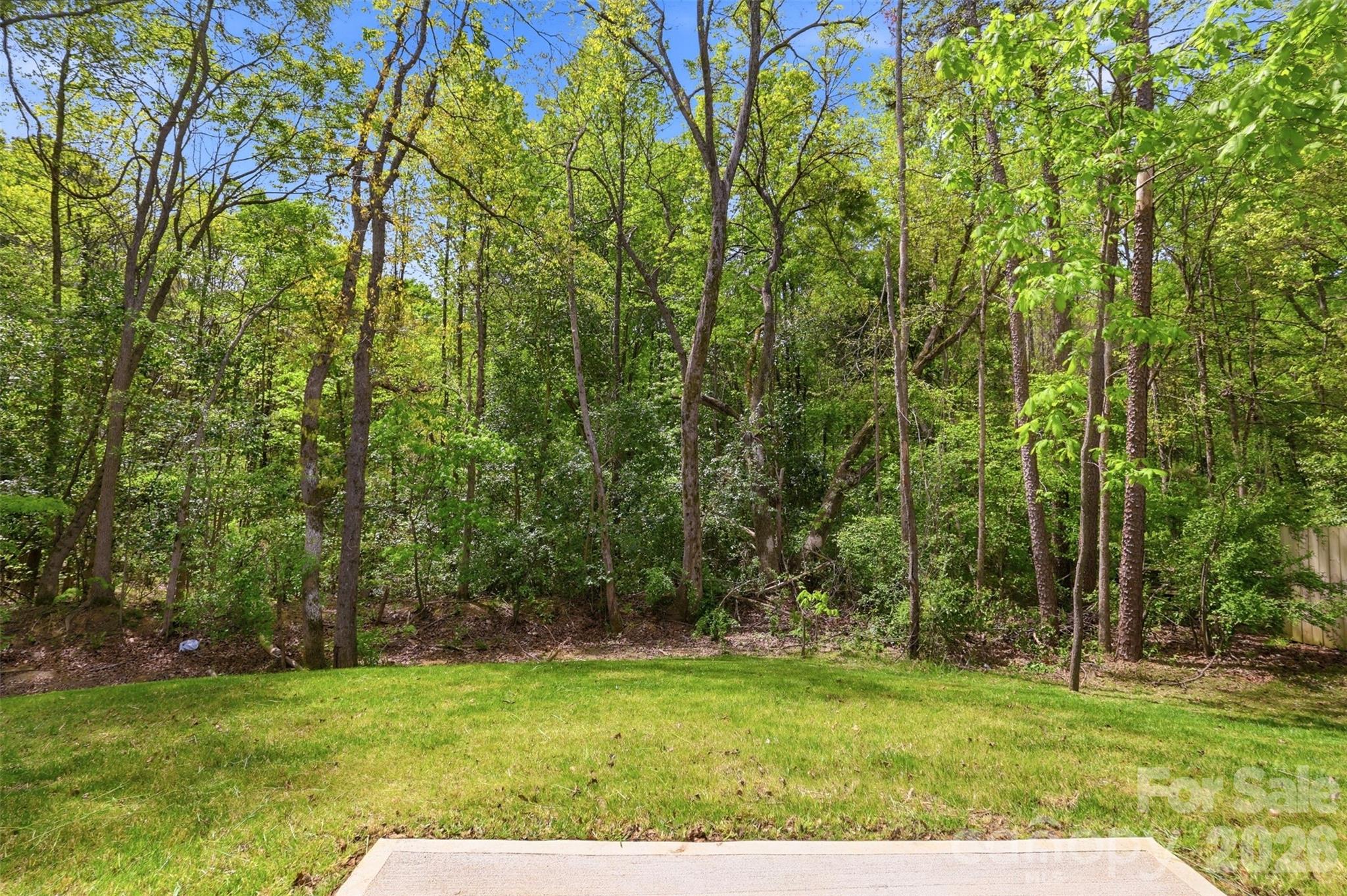 4015 Oakdale Road Charlotte, NC 28216 - Photo 21 of 30 a view of grassy field with trees
