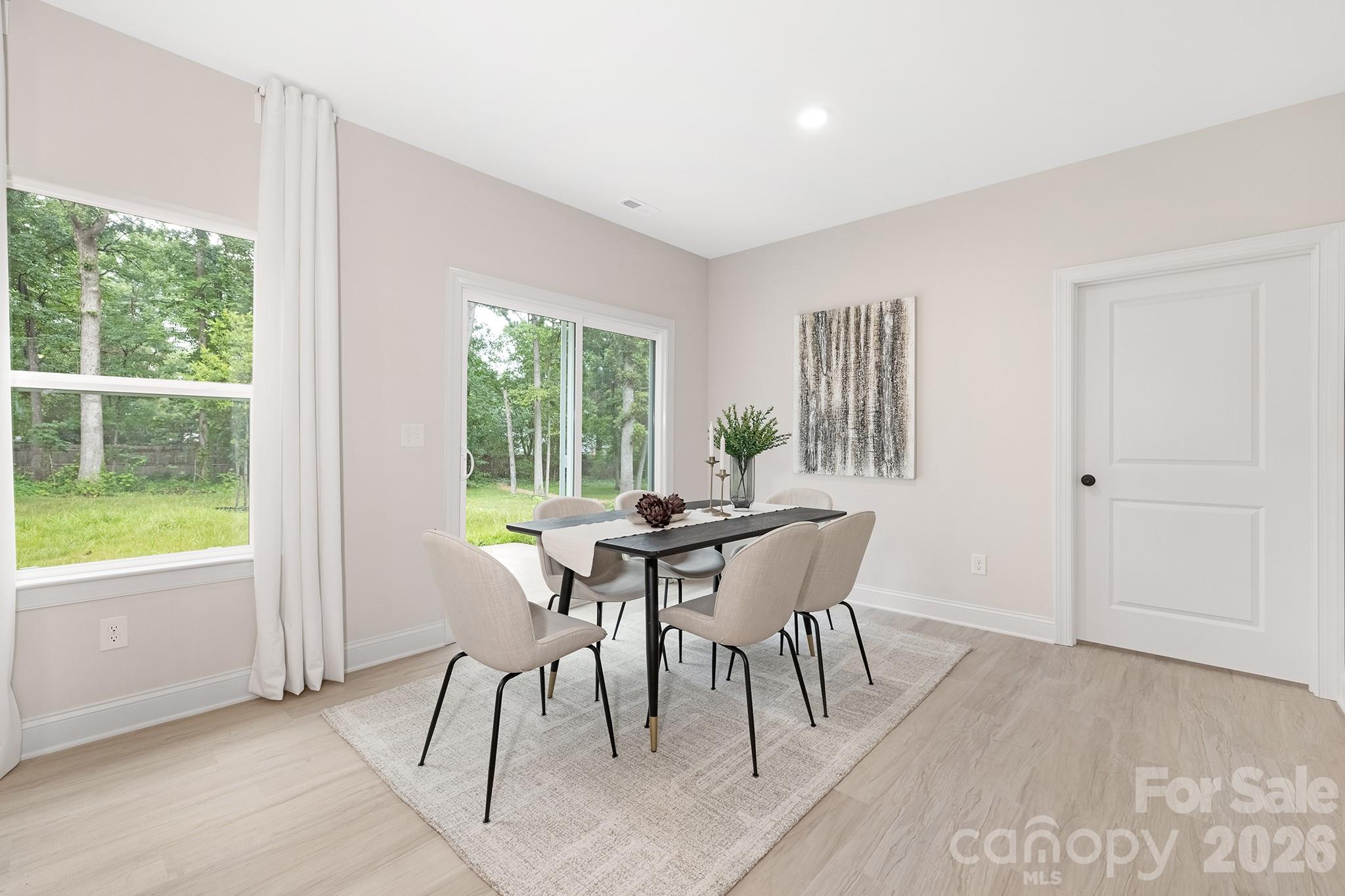 4015 Oakdale Road Charlotte, NC 28216 - Photo 8 of 30 a view of a dining room with furniture window and outside view