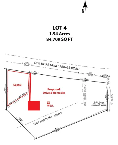 a view of field with tall trees
