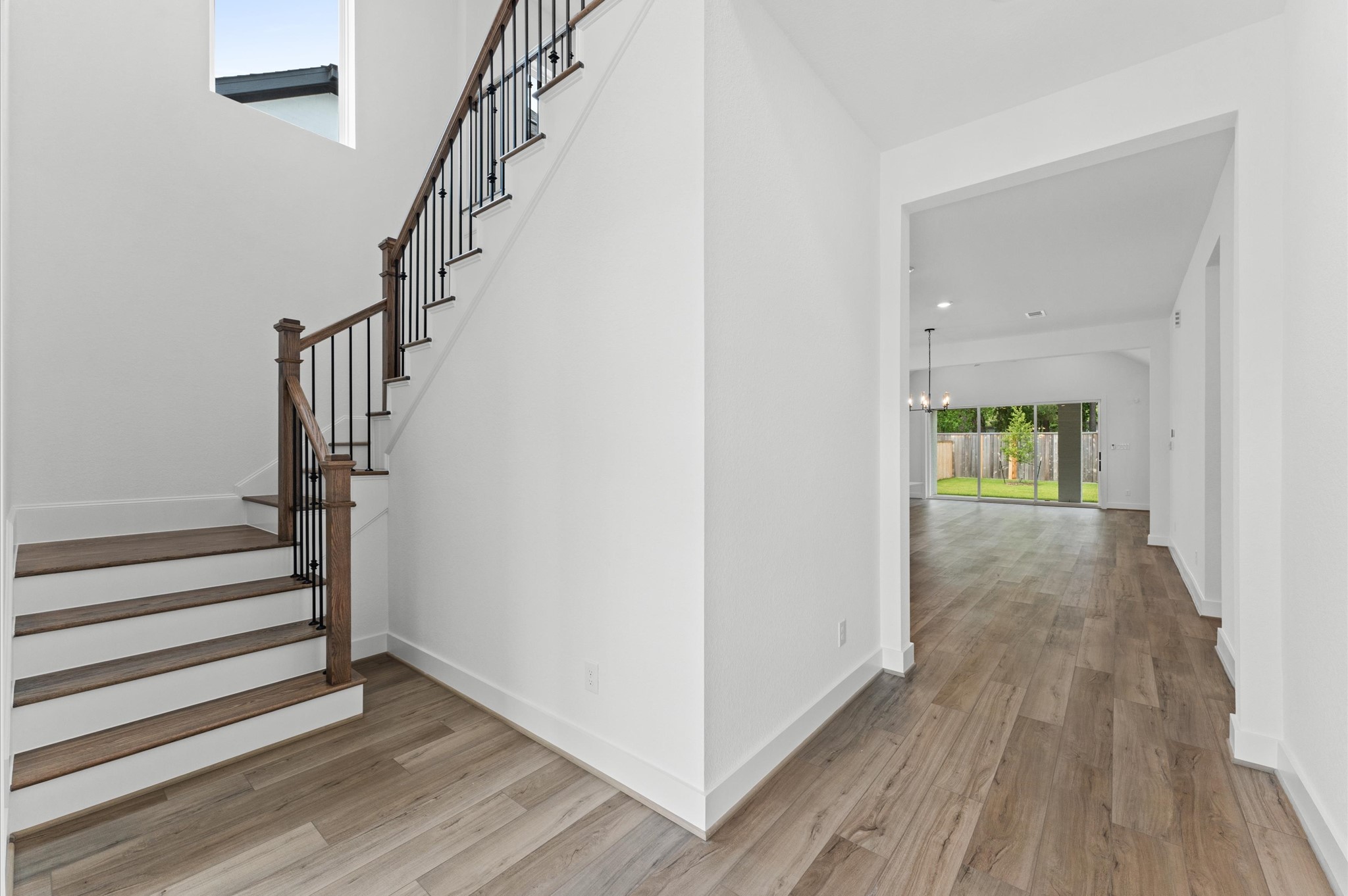8218 Sherman Pk Trail Spring, TX 77389 - Photo 4 of 28 a view of entryway with wooden floor