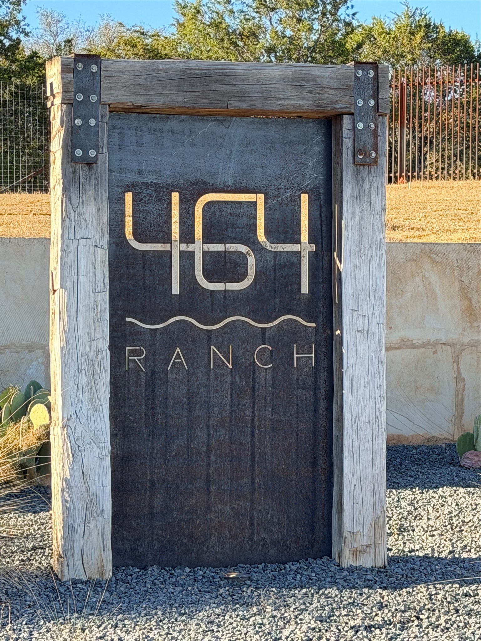 Lot 67 464th Ranch Johnson City, TX 78636 - Photo 2 of 9 a brick building with a sign on it