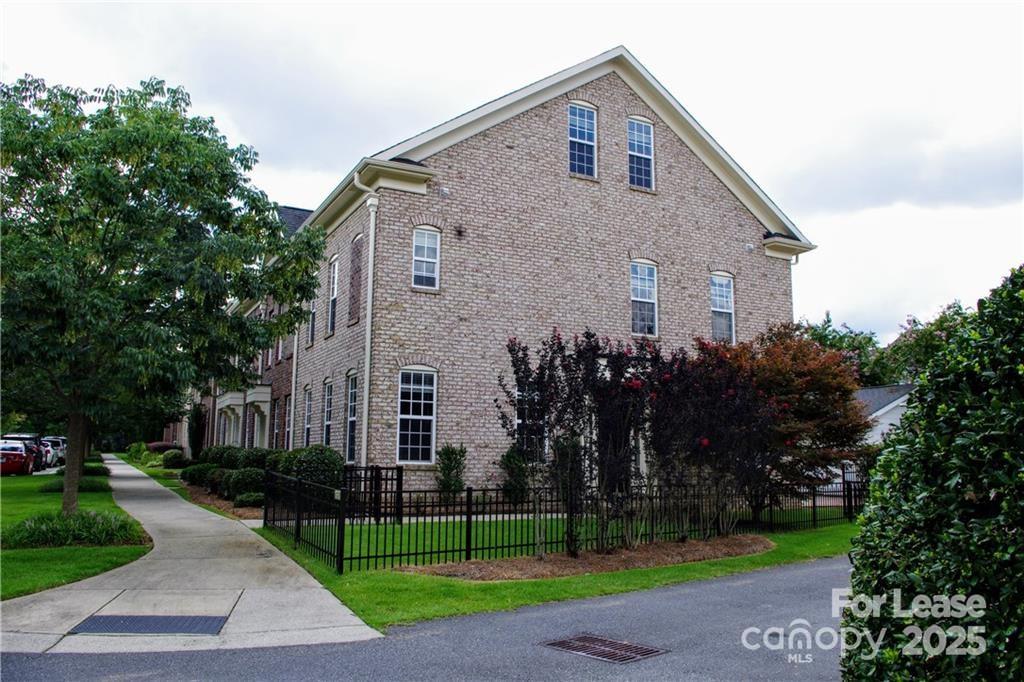 916 Gardners Way Cornelius, NC 28031 - Photo 35 of 35 a front view of a house with a yard