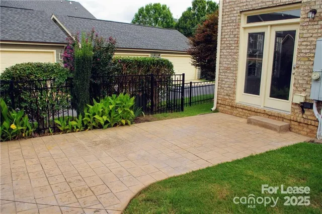 a view of a backyard with garden
