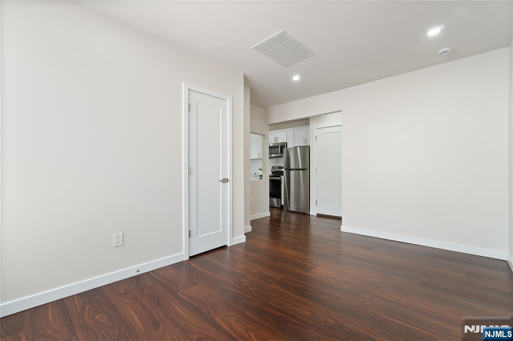 826 George Street, Unit 2 Plainfield, NJ 07062 - Photo 11 of 30 a view of empty room with wooden floor