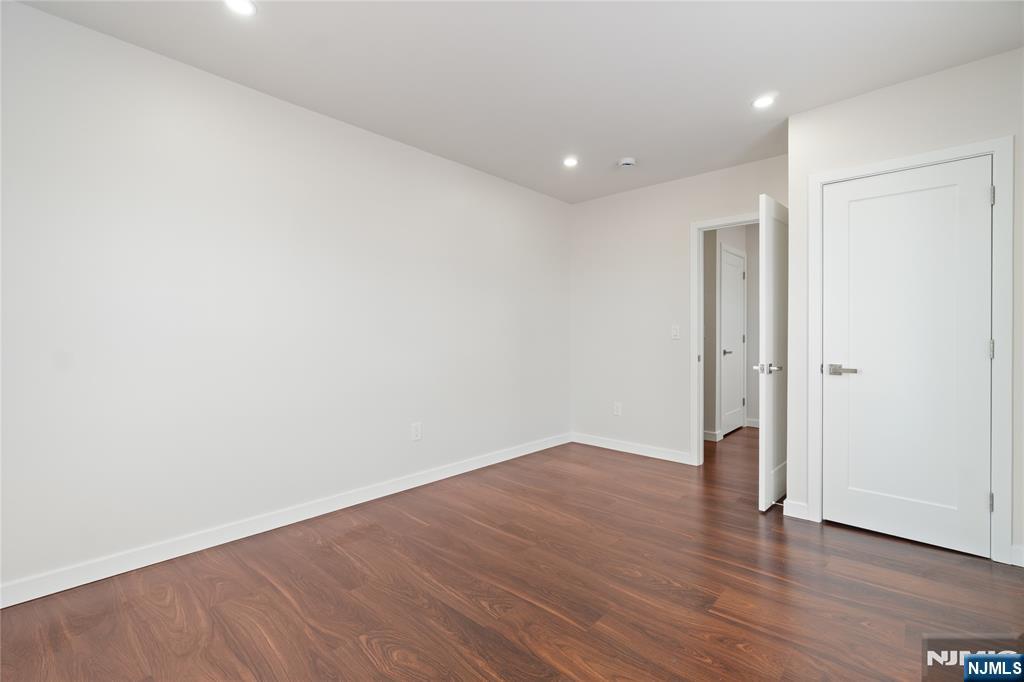 826 George Street, Unit 2 Plainfield, NJ 07062 - Photo 13 of 30 a view of an empty room with wooden floor