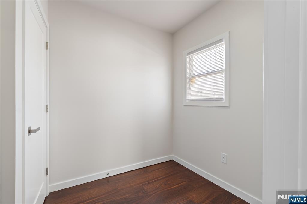 826 George Street, Unit 2 Plainfield, NJ 07062 - Photo 17 of 30 an empty room with a window and wooden floor