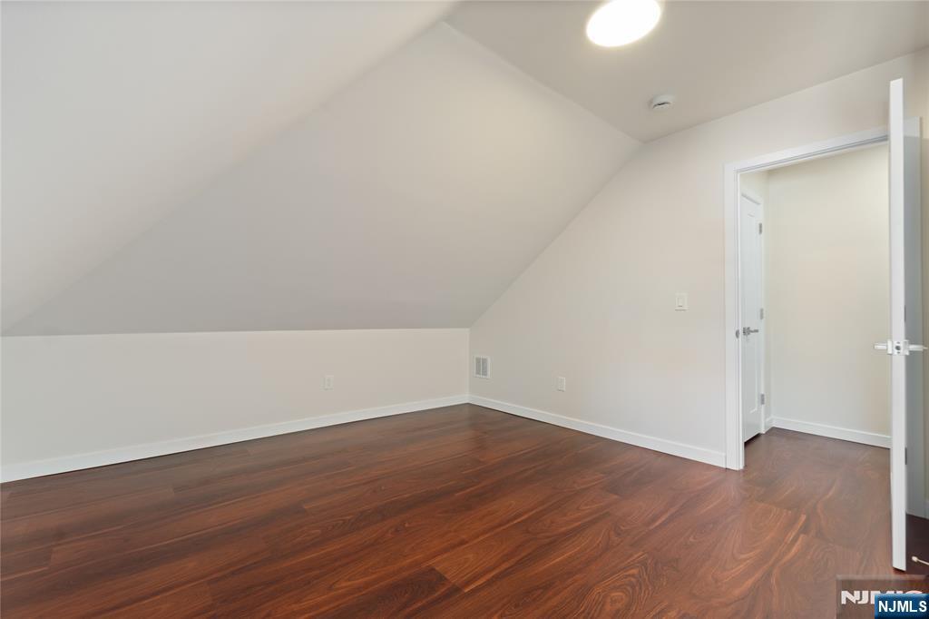 826 George Street, Unit 2 Plainfield, NJ 07062 - Photo 18 of 30 a view of an empty room with wooden floor