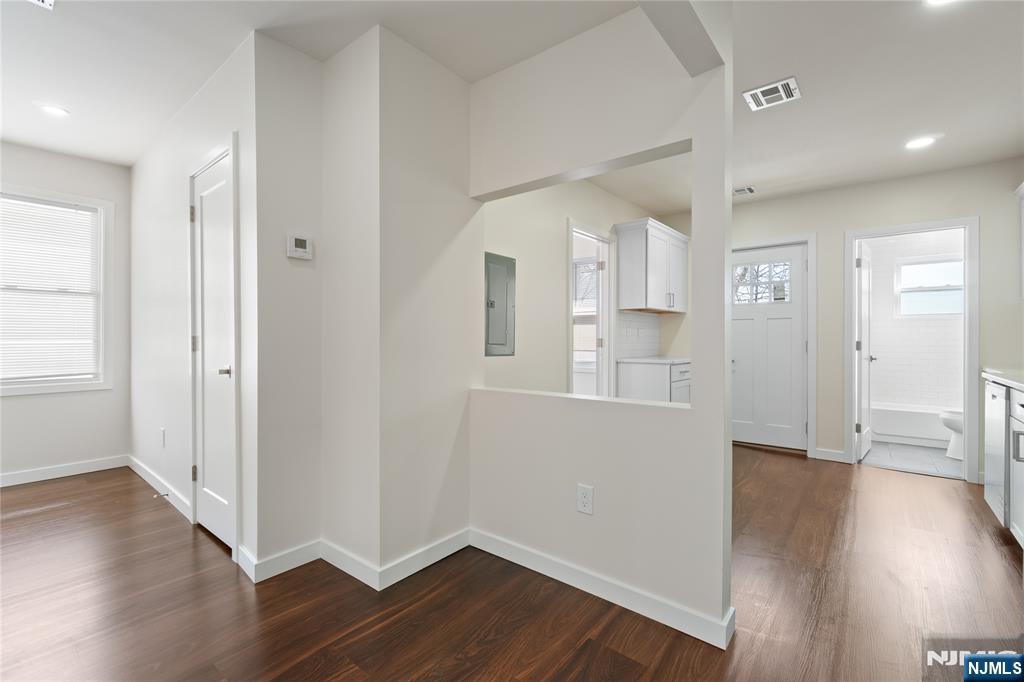 826 George Street, Unit 2 Plainfield, NJ 07062 - Photo 2 of 30 wooden floor in an empty room with a window