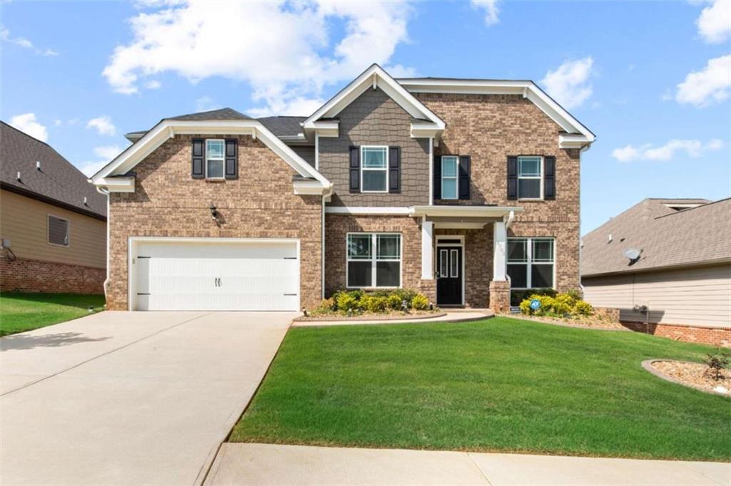 3702 Maple Hill Road Stonecrest, GA 30038 - Photo 1 of 1 a front view of a house with a yard