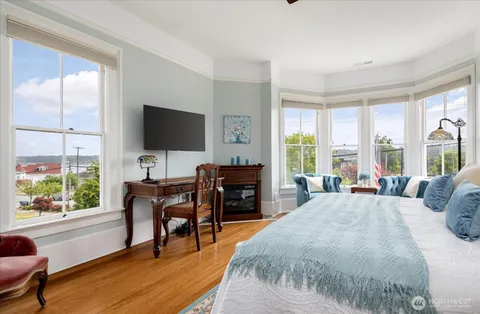 a bath room with a table and a window