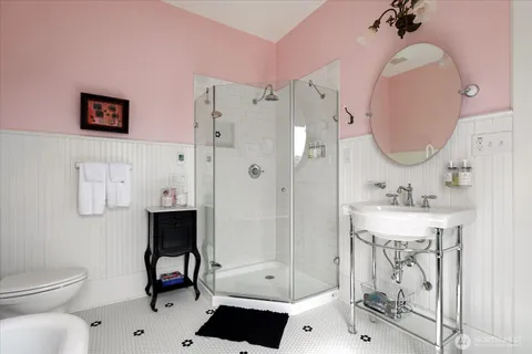 a bedroom with a bed and dresser