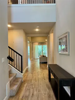 a view of livingroom with furniture and floor to ceiling window