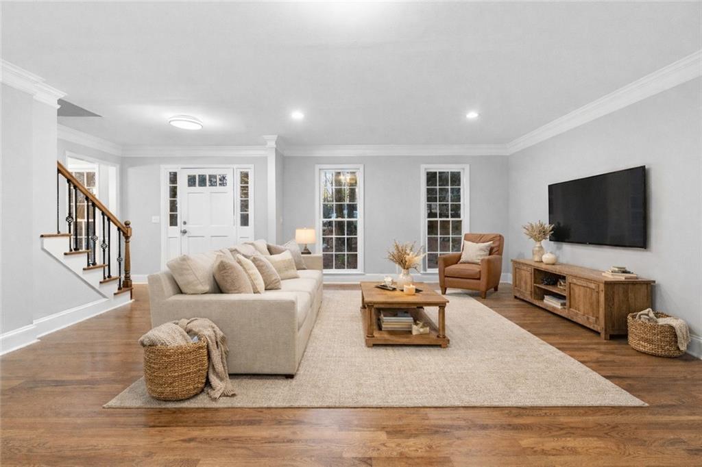 3907 Brinton Mill Road Marietta, GA 30062 - Photo 15 of 61 a living room with furniture and a flat screen tv