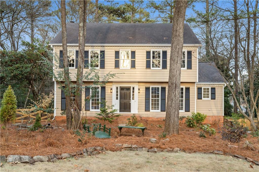 3907 Brinton Mill Road Marietta, GA 30062 - Photo 2 of 61 front view of a house with a yard