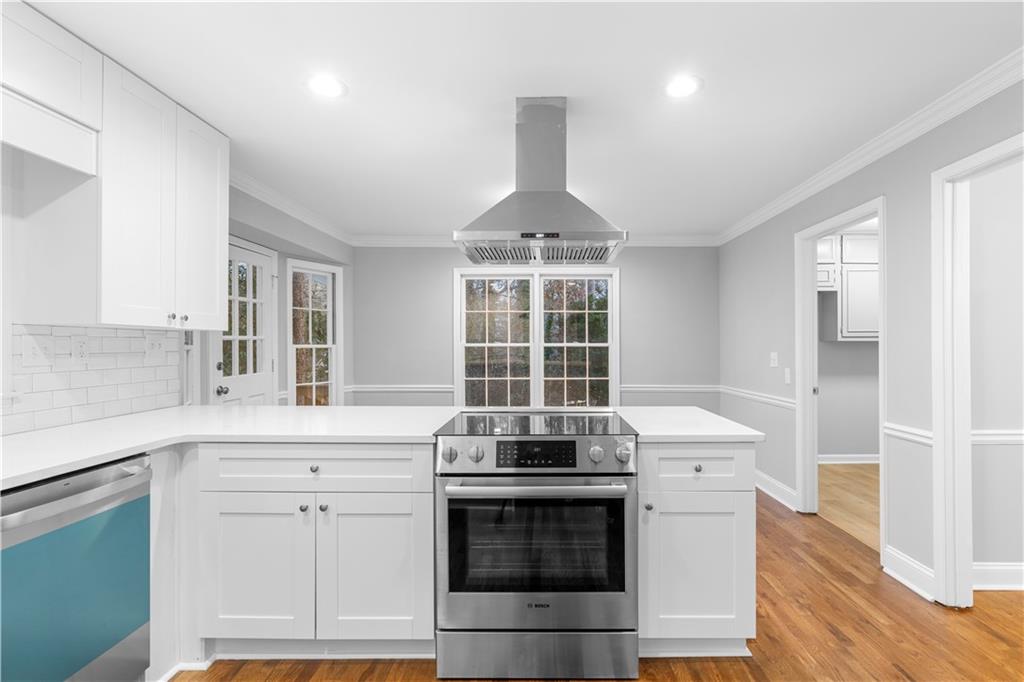 3907 Brinton Mill Road Marietta, GA 30062 - Photo 23 of 61 a kitchen with granite countertop a sink stainless steel appliances and cabinets