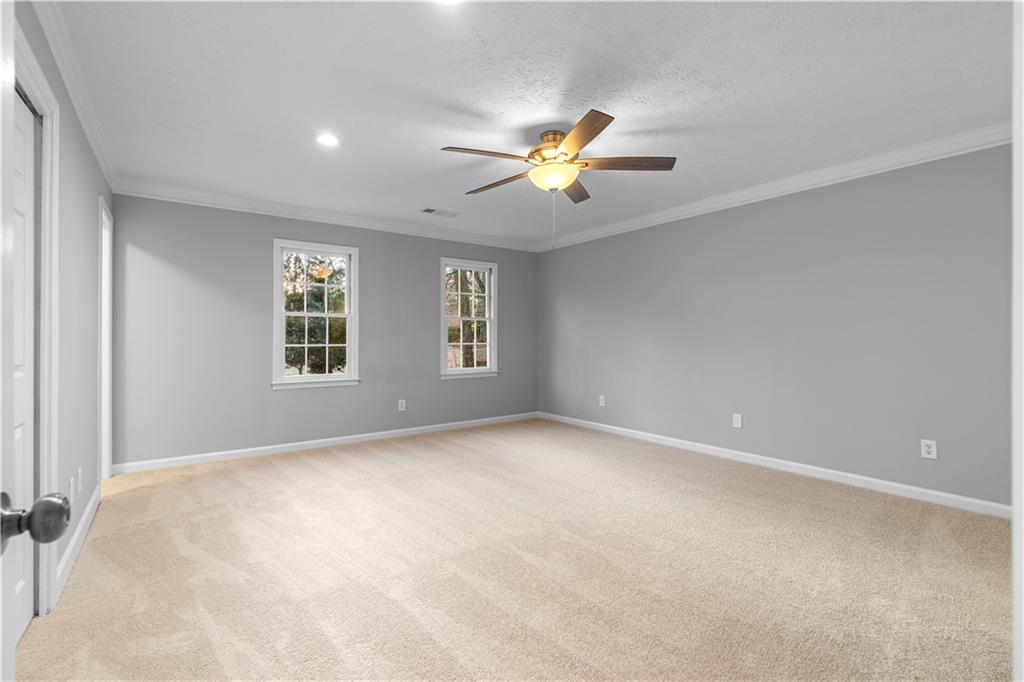 3907 Brinton Mill Road Marietta, GA 30062 - Photo 30 of 61 a view of an empty room with a window