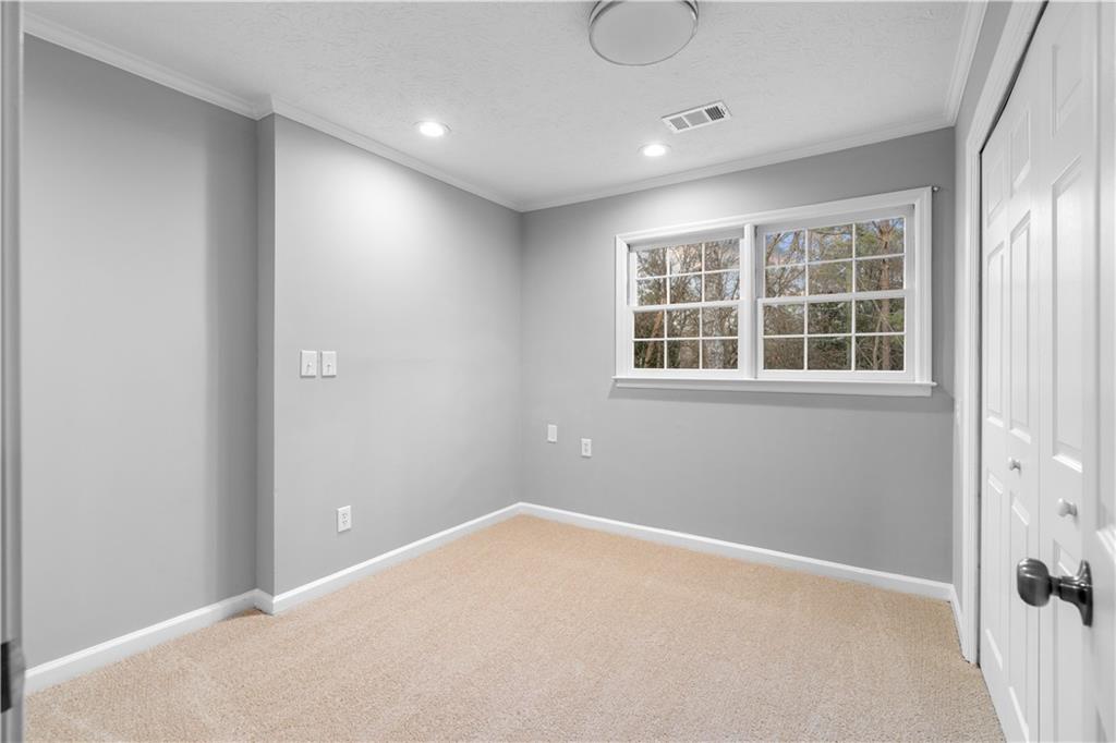 3907 Brinton Mill Road Marietta, GA 30062 - Photo 36 of 61 an empty room with a window