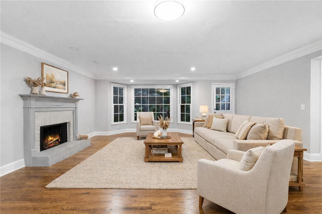 3907 Brinton Mill Road Marietta, GA 30062 - Photo 10 of 61 a living room with furniture and a fireplace