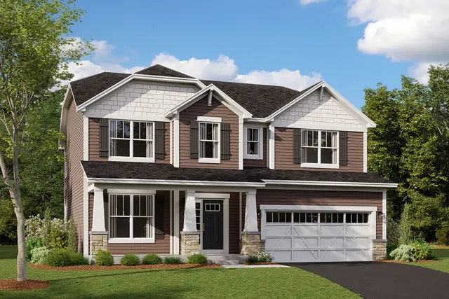a view of a white house with large windows and a yard with plants and large trees