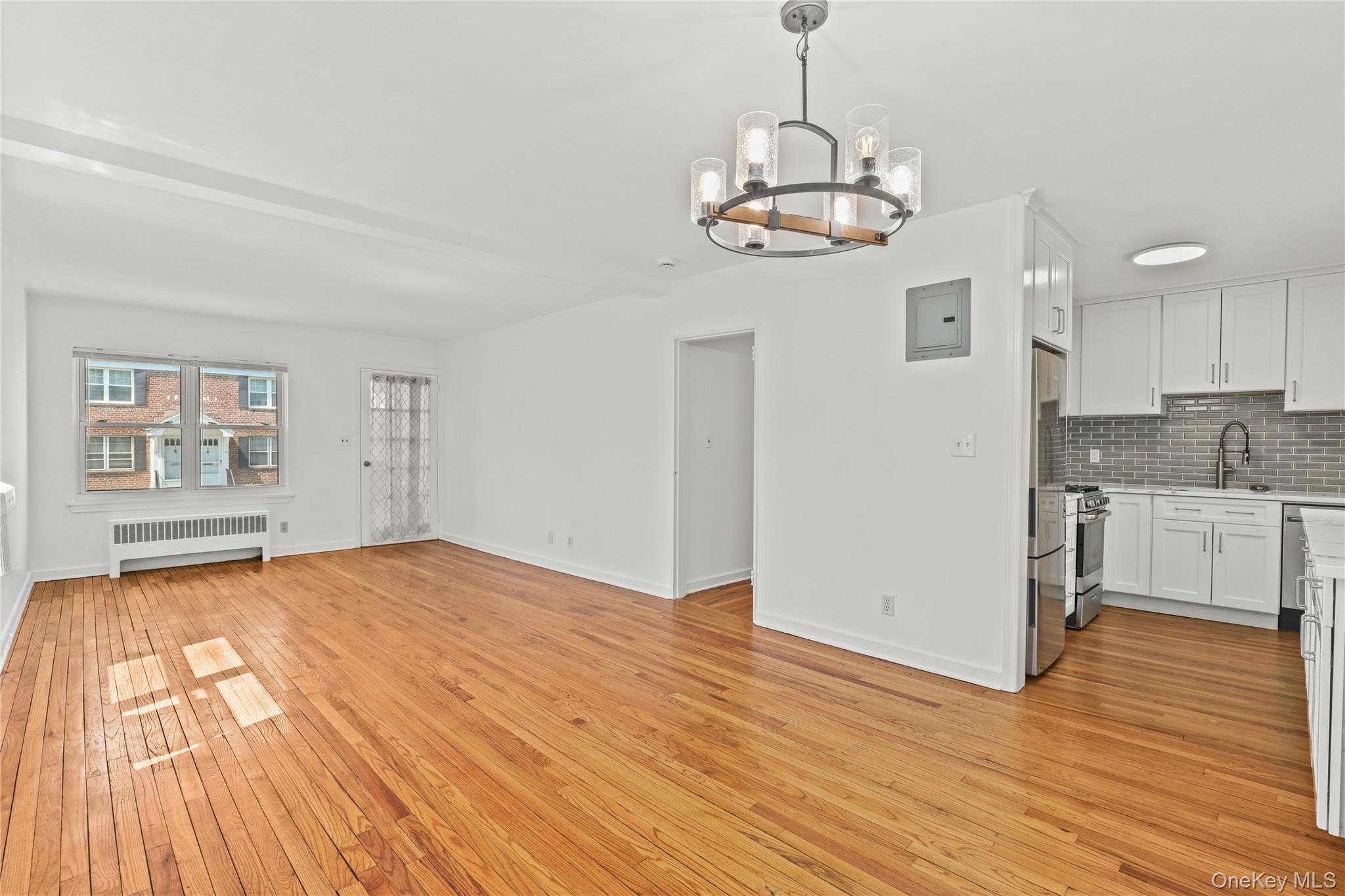 2 Peck Avenue, Unit 27A Rye, NY 10580 - Photo 2 of 15 View into Kitchen from LR/DR