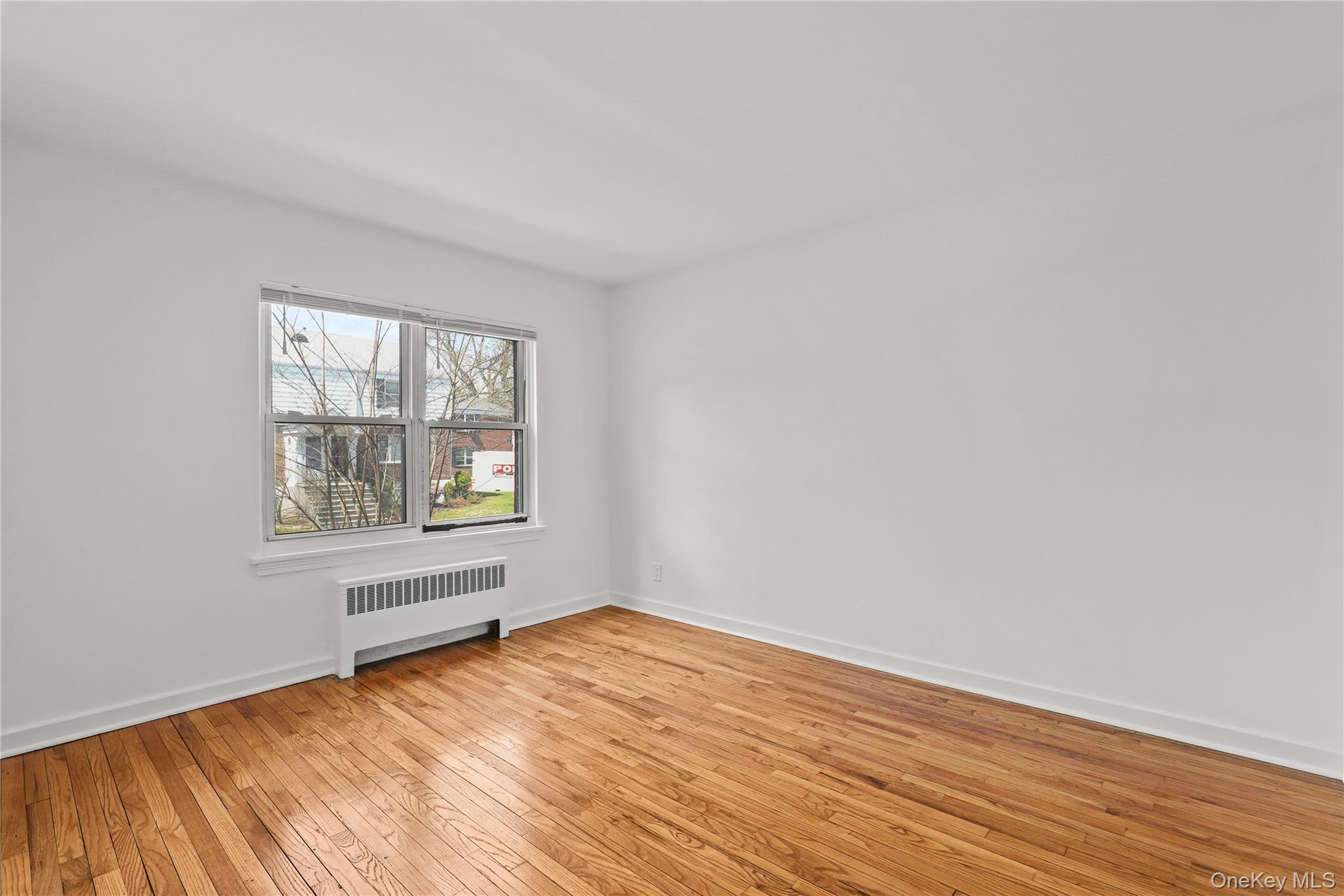 2 Peck Avenue, Unit 27A Rye, NY 10580 - Photo 9 of 15 Primary Bedroom overlooks Courtyard