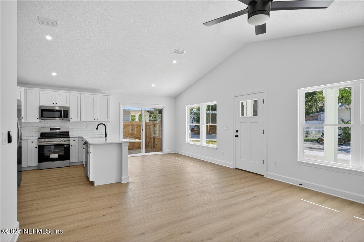 69 Josiah Street St. Augustine, FL 32084 - Photo 13 of 50 a view of kitchen with stove and cabinets