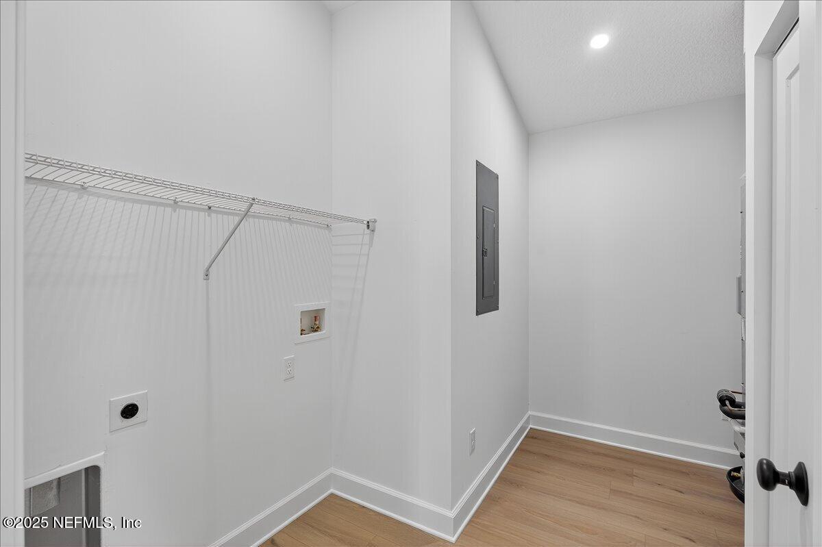 69 Josiah Street St. Augustine, FL 32084 - Photo 16 of 50 a view of a room with wooden floor