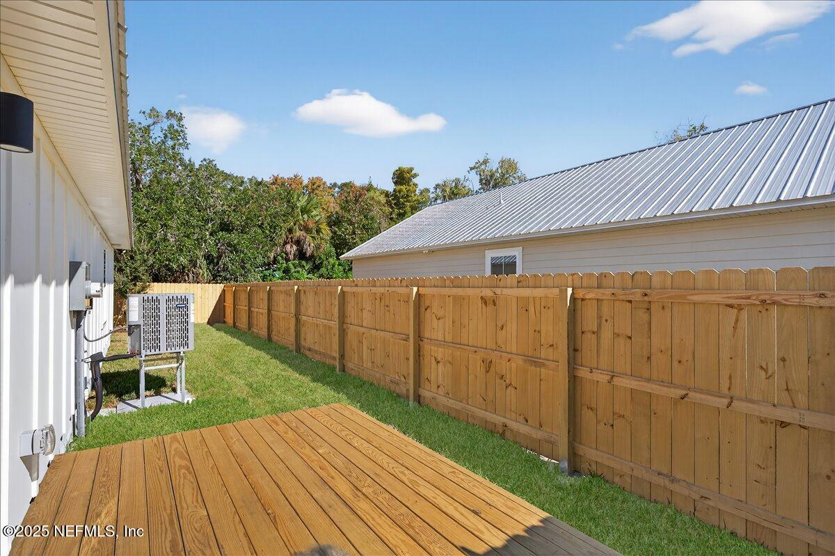 69 Josiah Street St. Augustine, FL 32084 - Photo 36 of 50 a view of a backyard with wooden fence