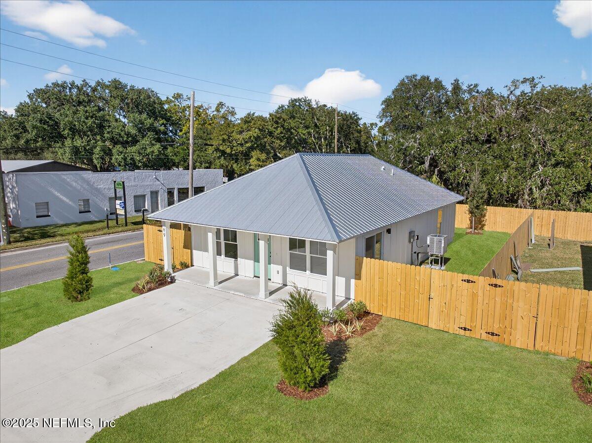 69 Josiah Street St. Augustine, FL 32084 - Photo 4 of 50 a house view with a garden space