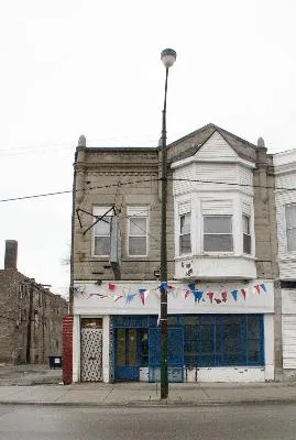 a front view of a building with a street