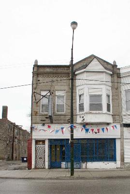 5517 South Halsted Street Chicago, IL 60621 - Photo 1 of 8 a front view of a building with a street