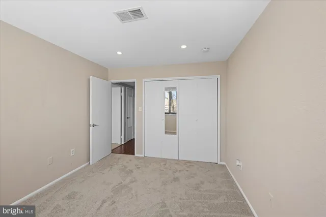 a view of hallway with a window