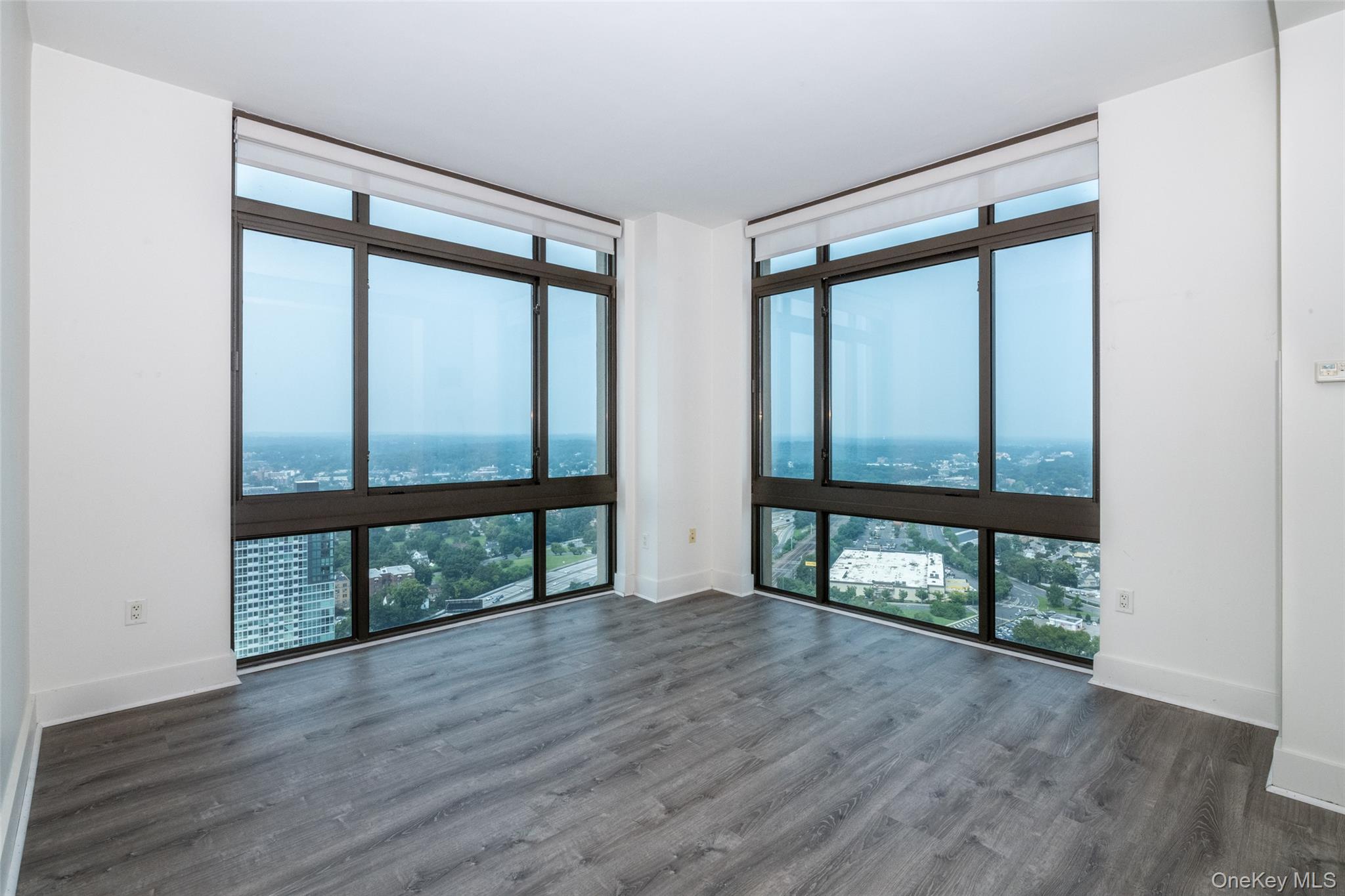 175 Huguenot Street, Unit PH204 New Rochelle, NY 10801 - Photo 9 of 10 Large floor to ceiling windows