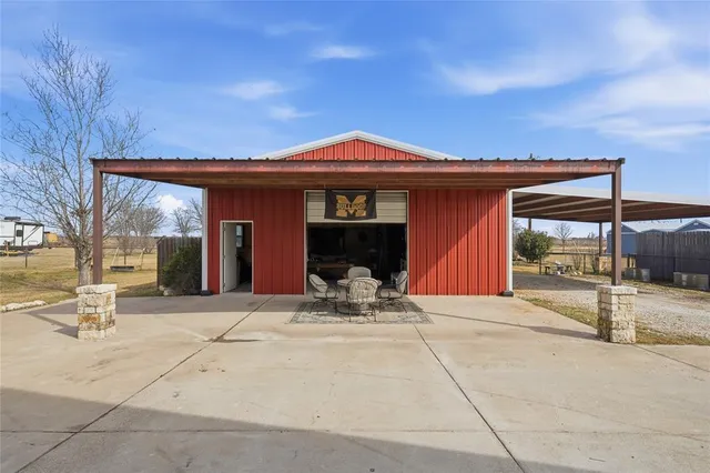 a view of a house with outdoor space and porch