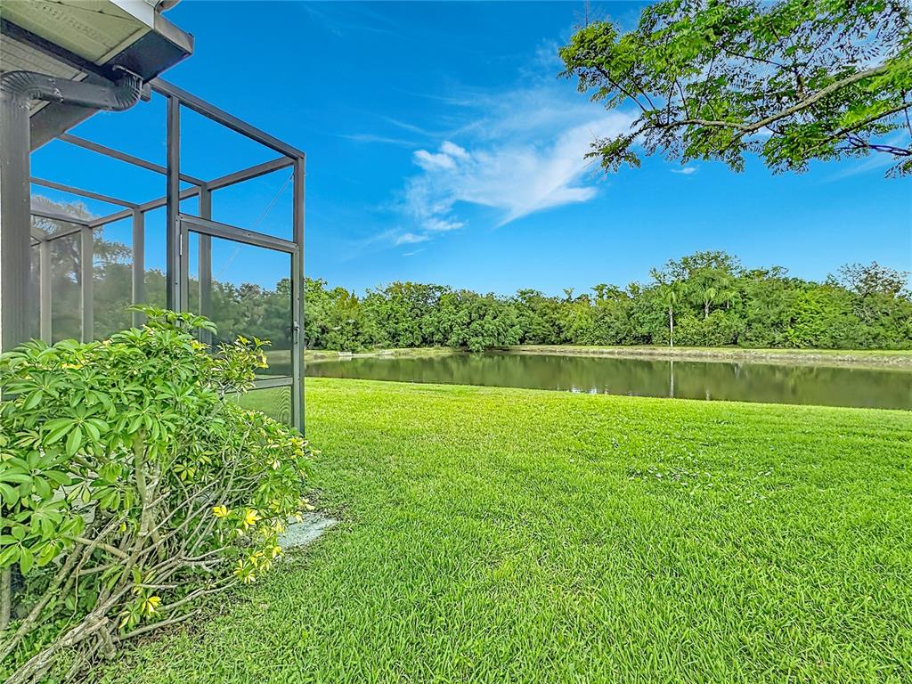 8721 Stone Harbour Loop Bradenton, FL 34212 - Photo 47 of 71 a view of a yard with a lake view