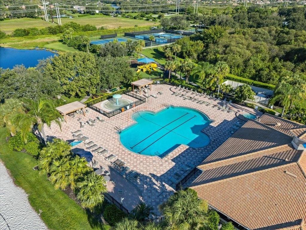 8721 Stone Harbour Loop Bradenton, FL 34212 - Photo 49 of 71 an aerial view of a house