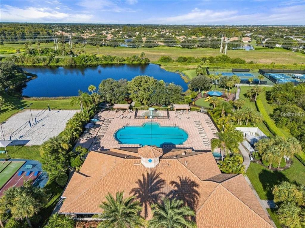 8721 Stone Harbour Loop Bradenton, FL 34212 - Photo 54 of 71 an aerial view of residential houses with outdoor space