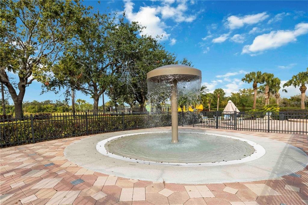 8721 Stone Harbour Loop Bradenton, FL 34212 - Photo 55 of 71 a view of a swimming pool with a fountain